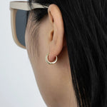 Load image into Gallery viewer, Gold Huggie Hoop Earrings with Dainty CZ Design for Women | Soria Jewelry