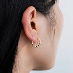 Load image into Gallery viewer, Chic Gold Huggie Earrings with Sparkling CZ Design for Women | Soria Jewelry
