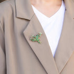 Load image into Gallery viewer, Frog Brooch Pin with Green Crystal and Gold Tone Design for Women | Soria Jewelry
