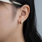 Load image into Gallery viewer, Gold Huggie Hoop Earrings with Dainty CZ Design for Women | Soria Jewelry
