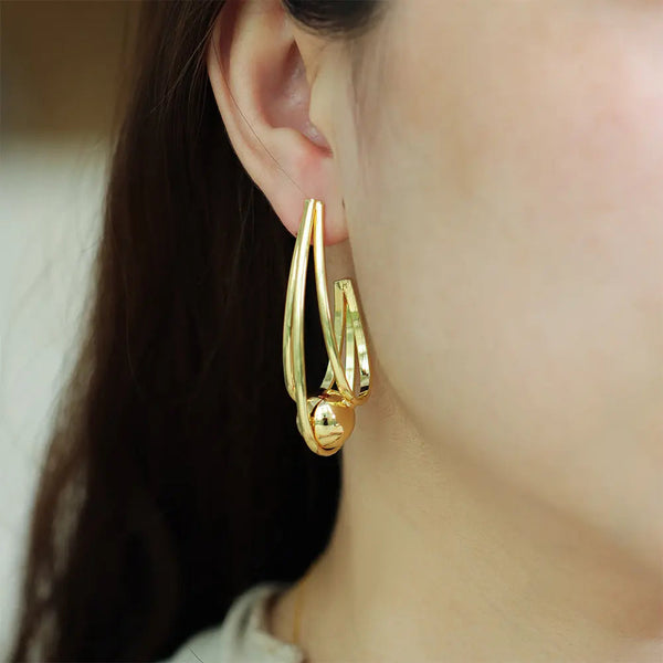 Twist Hoop Earrings with Gold Tone Ball Geometric Design for Women | Soria Jewelry